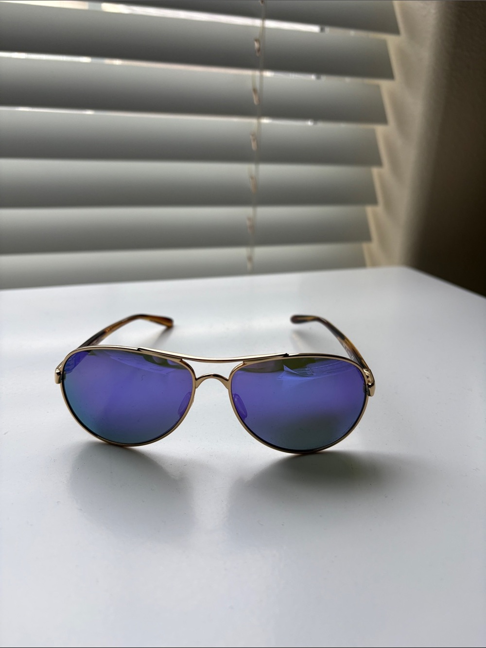 Oakley Gold Aviator Sunglasses with Blue Mirrored Lenses